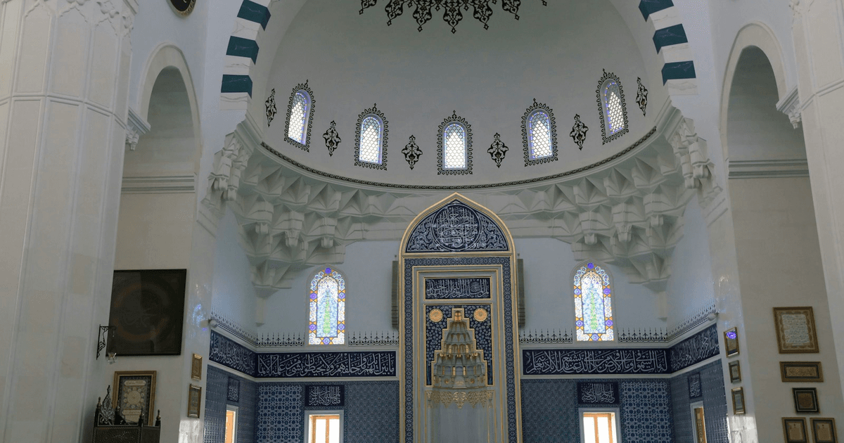 Grand mosque interior with domed ceiling, representing Al-Azhar and Ijazah Quran teacher credentials